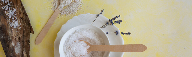 Natural wellness beauty ingredients on pink background. Health care spa therapy with oat, sea salt and lavender,  super food for the skin