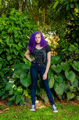 Young woman with colored hair posing for photo