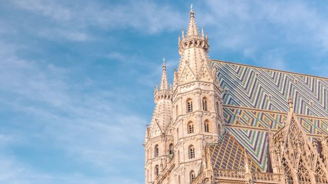 Top of St. Stephen's Cathedral timelapse (Stephansdom, Domkirche St. Stephan), the mother church of Roman Catholic Archdiocese of Vienna and one of the tallest churches in the world, Stephansplatz