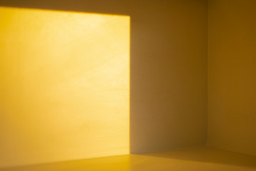 Light and shadow in the bright yellow room