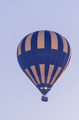 hot air balloon is flying at sunrise. romantic balloon flights