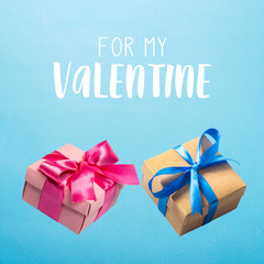 Two gifts flying in the air on a blue background. Concept gift for a loved one, birthday, Valentine's Day. Levitation