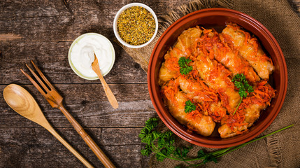 Russian Stuffed Cabbage Rolls on Wooden Background. Selective focus.