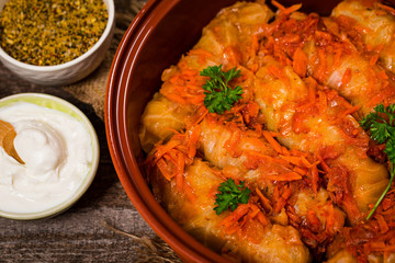 Russian Stuffed Cabbage Rolls on Wooden Background. Selective focus.