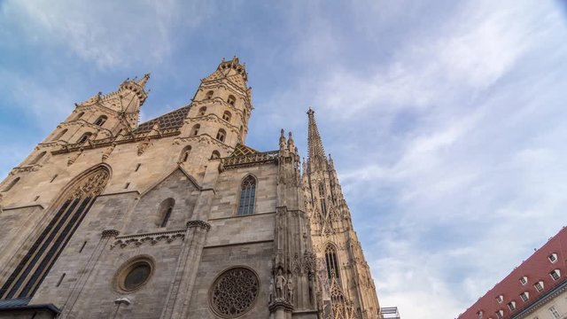 St. Stephen's Cathedral timelapse hyperlapse (Stephansdom, Domkirche St. Stephan), the mother church of Roman Catholic Archdiocese of Vienna and one of the tallest churches in the world, Stephansplatz