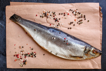 herring (healthy food, salted raw fish and spices) menu concept. food background. top view. copy space