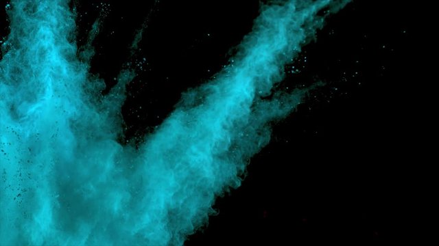 Realistic sky blue powder explosion on black background. Slow motion movement with acceleration from left corner
