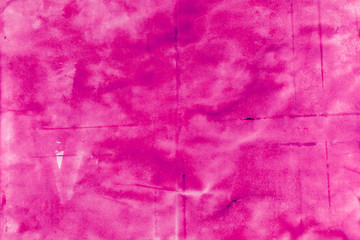 Old crumpled shabby pink paper. Paper surface texture.