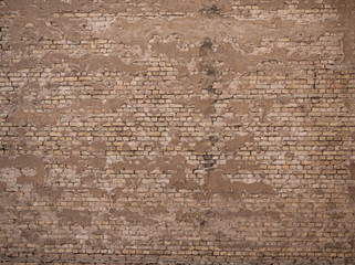 Old beige grunge brick wall background texture with dirty and vintage style pattern.