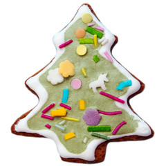 Gingerbread cookies Christmas tree for Christmas and New year. Gingerbread. Gifts and celebration. Festive background. Isolated cookies. Christmas cookies on a bright colored background.