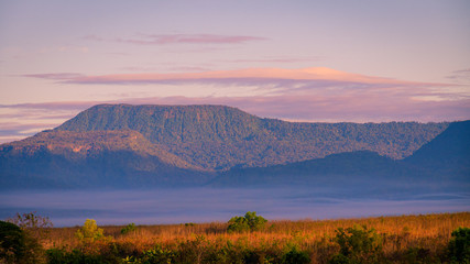 Fototapeta premium Scenic View Of Mountains Against Sky During Sunrise