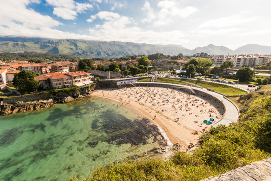 Llanes, Spain. Views of the Playa de El Sablon, a famous beach in the seaside and port town of Llanes, in Asturias