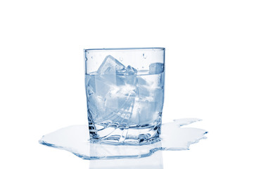 Glass with ice cubes  isolated on white background