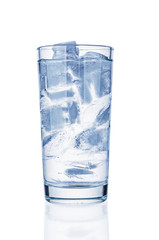Glass with pure water and ice on white background