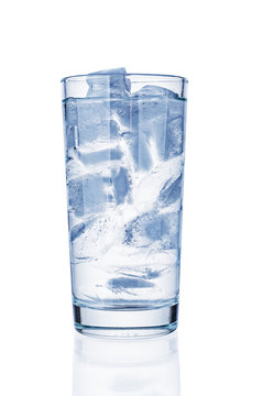 Glass with pure water and ice on white background