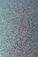 Ice and frost on a window pane in winter. Crystal surface of frozen water. Weather forecast: cold, frost, cooling. Abstract blue background or wallpaper. Harsh season. Vertical shot