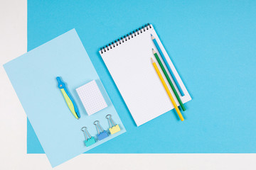 Stationery isolated on blue and white background