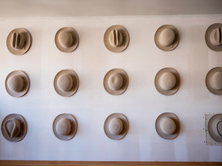 Wall display of hats in a retail store