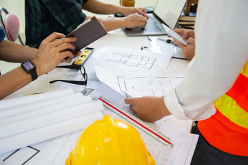 Team work Architectural work site desk background construction project ideas concept, With drawing equipment