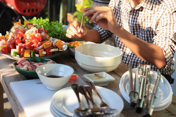 Barbeque Grill Street Food in thailand,Eat outdoors in a happy family.