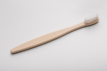 Eco natural bamboo toothbrush on white background