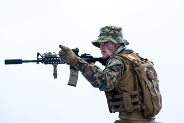 Fototapeta premium soldier in action aiming laseer sight optics