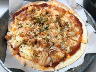 Close up of thin and crispy pizza