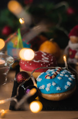 Christmas cakes on the table with tangerines