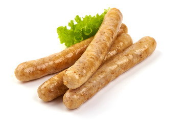 Grilled barbecue chicken sausages, isolated on white background