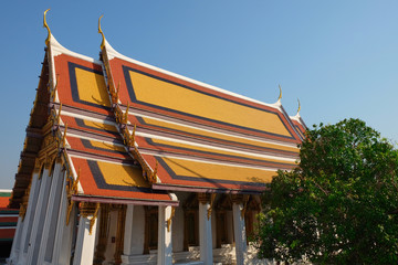Beautiful painted roof at a large Buddhist temple in Bangkok.