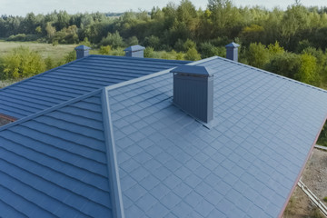 Corrugated metal roof and metal roofing. Modern roof made of met