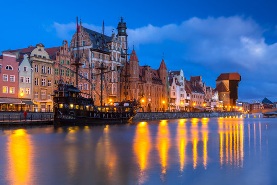 Beautiful scenery of the old town in Gdansk over Motlawa river at dawn, Poland.