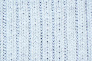 background and texture white knitted woolen fabric..