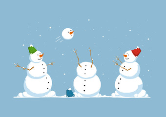 Funny snowmen playing snowballs