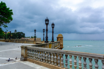 Old Embankment in cloudy weather. Cadiz, Andalusia, Spain.