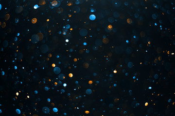 abstract bokeh background, colorful particles