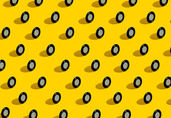Vinyl records on a yellow background. Pattern