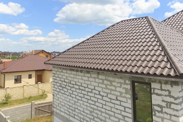 Corrugated metal roof and metal roofing. Modern roof made of met