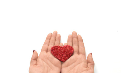 The red Heart shapes on abstract light glitter background in love concept for valentines day with sweet and romantic moment