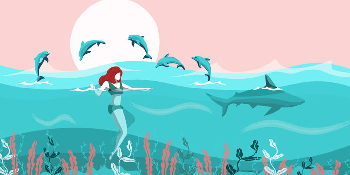 girl swimming dolphins