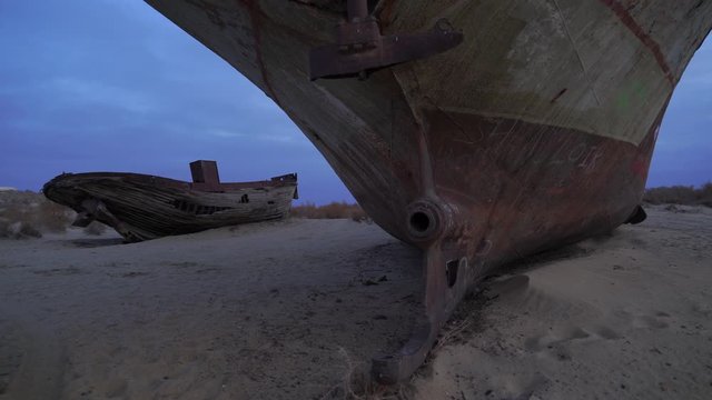 abandoned ships at the bottom of the dried sea Aral 4k