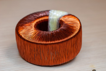 Toroidal transformer, composed of wrapped copper coil