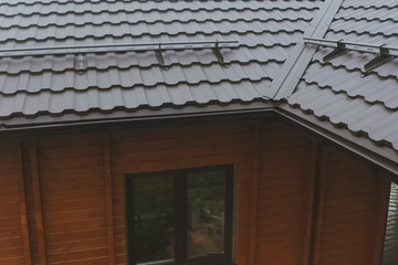 Corrugated metal roof and metal roofing. Modern roof made of met