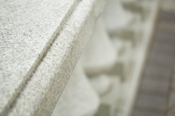 Elements of urban architecture. Fragments of a handrail from granite.