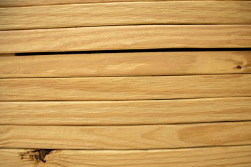 Fototapeta premium Large stack of pine wood planks at a home improvement store