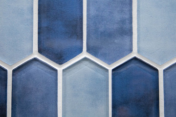 Various shades of blue glass ceramic tile for a bathroom or kitchen floor or backsplash for an update, renovation and home improvement