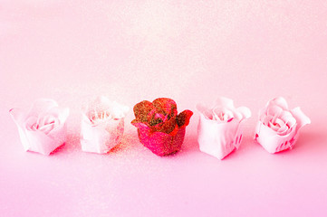 Festive concept from rosebuds on pink background. Valentines Day. Template mock up of greeting card or text design