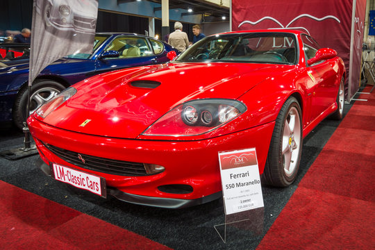MAASTRICHT, NETHERLANDS - JANUARY 15, 2016: Grand tourer Ferrari 550 Maranello. The designer of the car body Lorenzo Ramaciotti at Pininfarina. International Exhibition InterClassics & Topmobiel 2016