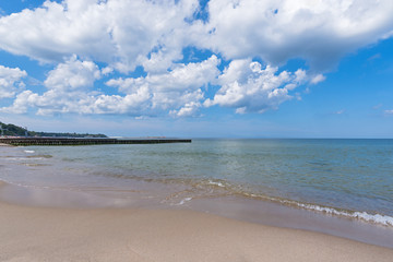 The beach along the Baltic Sea in sunny summer day. City Pionersky, Kaliningrad region