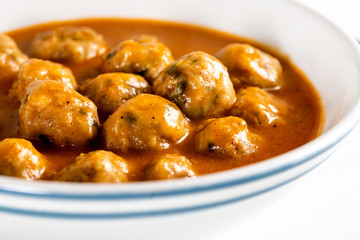 Plate of meatballs soup / Turkish sulu kofte.